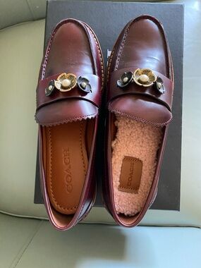 Coach Burgundy Leather Loafers with Gold Floral Accents
